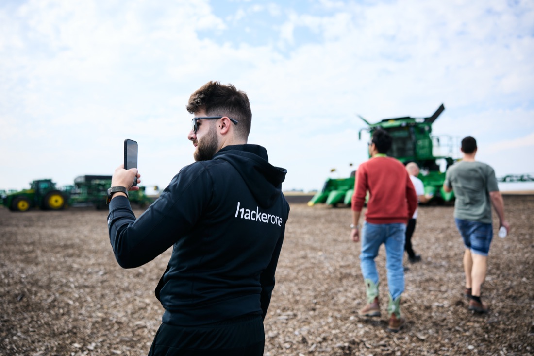Javier Corral photographing agricultural machinery during a hacking event